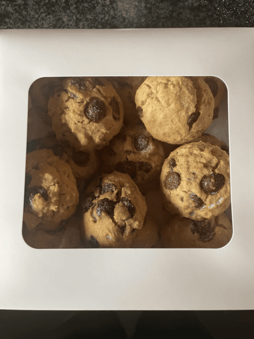 Golden brown cookies with choc chips on a plate