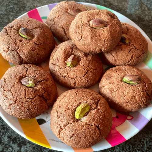 Shortbread discs of goodness with a a pistachio on top of each