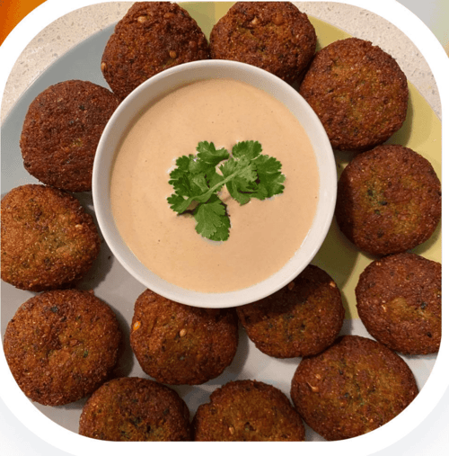 fresh fluffy & crispy golden falafel on a plate