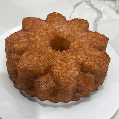 Fluffy & bright golden brown vanilla cake in a flower shape
